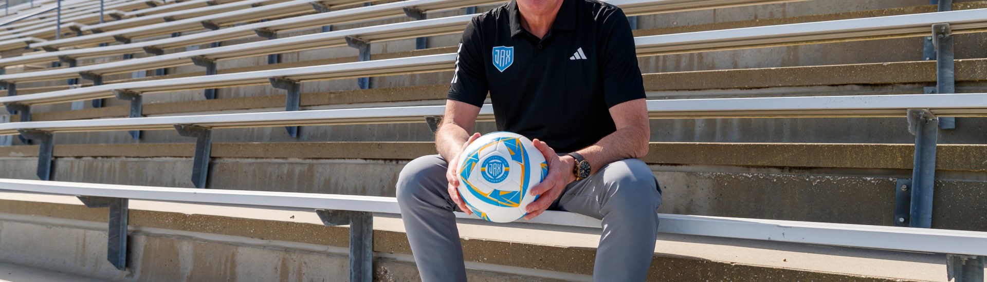 Mark Warburton sitting in the stands at Hodges Stadium